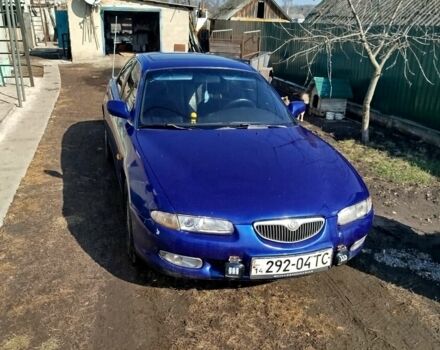 Синий Мазда Кседос 6, объемом двигателя 2 л и пробегом 350 тыс. км за 1750 $, фото 1 на Automoto.ua
