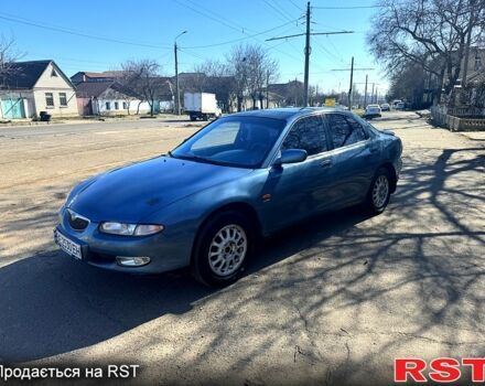 Синий Мазда Кседос 6, объемом двигателя 2 л и пробегом 360 тыс. км за 2499 $, фото 1 на Automoto.ua