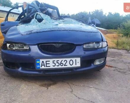 Синий Мазда Кседос 6, объемом двигателя 2 л и пробегом 300 тыс. км за 1200 $, фото 1 на Automoto.ua