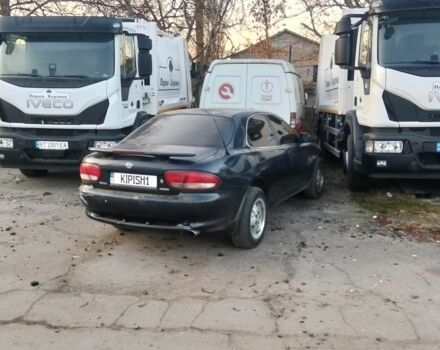 Синий Мазда Кседос 6, объемом двигателя 0 л и пробегом 420 тыс. км за 2510 $, фото 1 на Automoto.ua