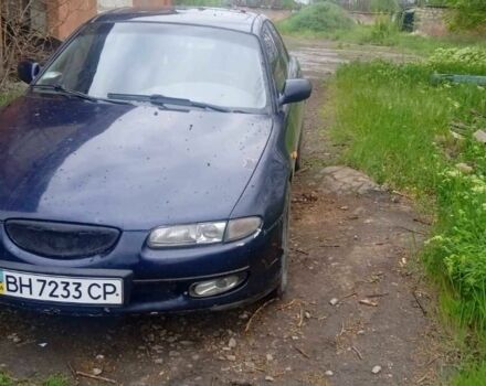 Синий Мазда Кседос 6, объемом двигателя 2 л и пробегом 3 тыс. км за 803 $, фото 1 на Automoto.ua