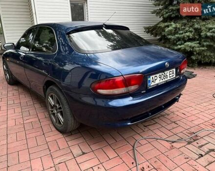 Синий Мазда Кседос 6, объемом двигателя 2 л и пробегом 150 тыс. км за 2000 $, фото 1 на Automoto.ua