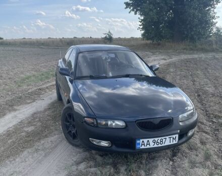 Синий Мазда Кседос 6, объемом двигателя 2 л и пробегом 384 тыс. км за 1603 $, фото 1 на Automoto.ua