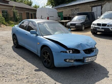 Синій Мазда Кседос 6, об'ємом двигуна 2 л та пробігом 284 тис. км за 650 $, фото 1 на Automoto.ua