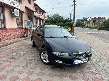 Синий Мазда Кседос 6, объемом двигателя 2 л и пробегом 350 тыс. км за 1100 $, фото 1 на Automoto.ua