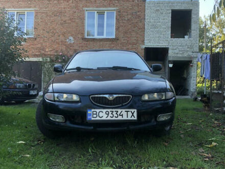 Синій Мазда Кседос 6, об'ємом двигуна 2 л та пробігом 380 тис. км за 1550 $, фото 1 на Automoto.ua