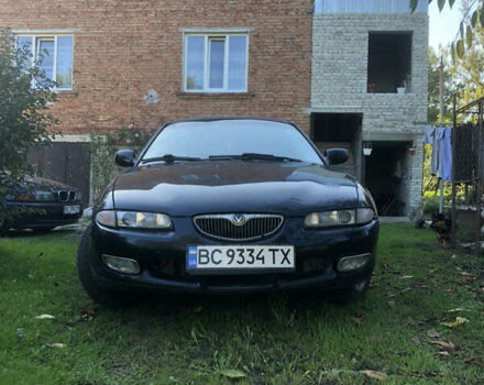 Синій Мазда Кседос 6, об'ємом двигуна 2 л та пробігом 380 тис. км за 1550 $, фото 1 на Automoto.ua