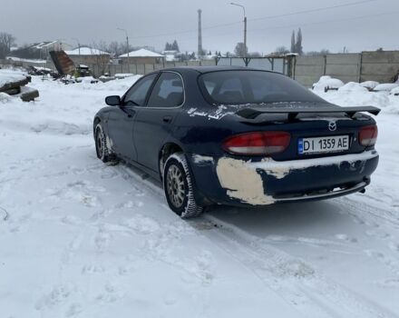 Синий Мазда Кседос 6, объемом двигателя 1.6 л и пробегом 415 тыс. км за 2100 $, фото 1 на Automoto.ua