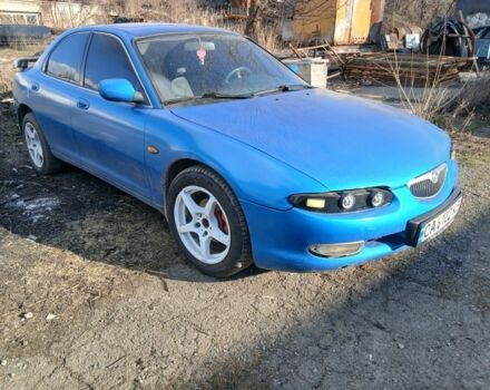 Синий Мазда Кседос 6, объемом двигателя 2 л и пробегом 336 тыс. км за 1986 $, фото 1 на Automoto.ua