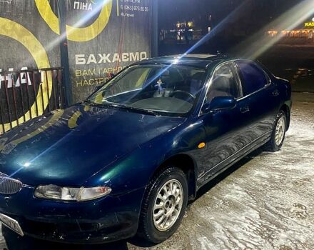 Синий Мазда Кседос 6, объемом двигателя 1.6 л и пробегом 200 тыс. км за 1400 $, фото 1 на Automoto.ua