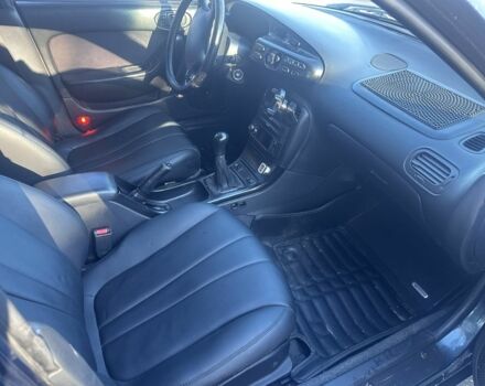 Зелений Мазда Кседос 6, об'ємом двигуна 2 л та пробігом 3 тис. км за 3200 $, фото 5 на Automoto.ua