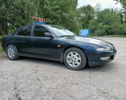 Зелений Мазда Кседос 6, об'ємом двигуна 2 л та пробігом 270 тис. км за 105000 $, фото 1 на Automoto.ua