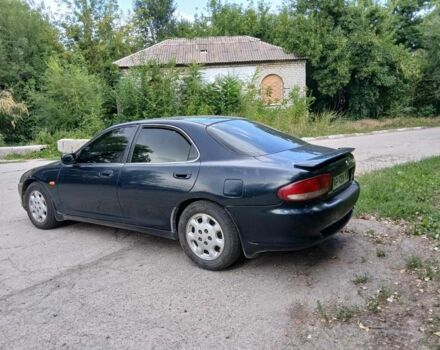 Зеленый Мазда Кседос 6, объемом двигателя 2 л и пробегом 300 тыс. км за 2040 $, фото 1 на Automoto.ua