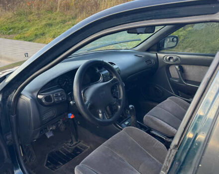 Зеленый Мазда Кседос 6, объемом двигателя 2 л и пробегом 230 тыс. км за 1350 $, фото 7 на Automoto.ua