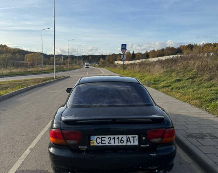 Зеленый Мазда Кседос 6, объемом двигателя 2 л и пробегом 230 тыс. км за 1350 $, фото 5 на Automoto.ua