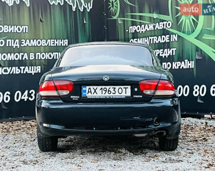 Зеленый Мазда Кседос 6, объемом двигателя 2 л и пробегом 213 тыс. км за 1900 $, фото 6 на Automoto.ua