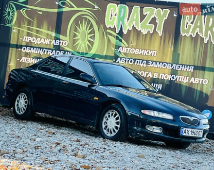 Зеленый Мазда Кседос 6, объемом двигателя 2 л и пробегом 213 тыс. км за 1900 $, фото 4 на Automoto.ua