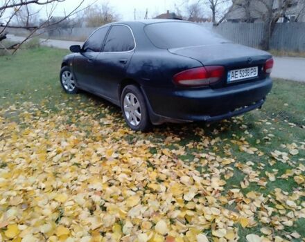 Зеленый Мазда Кседос 6, объемом двигателя 2 л и пробегом 400 тыс. км за 1500 $, фото 1 на Automoto.ua