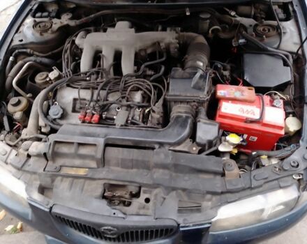 Зеленый Мазда Кседос 6, объемом двигателя 2 л и пробегом 400 тыс. км за 1500 $, фото 10 на Automoto.ua