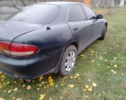 Зеленый Мазда Кседос 6, объемом двигателя 2 л и пробегом 400 тыс. км за 1500 $, фото 2 на Automoto.ua