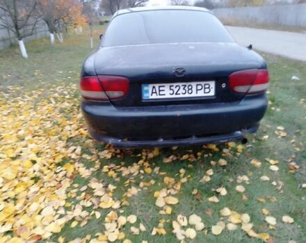 Зеленый Мазда Кседос 6, объемом двигателя 2 л и пробегом 400 тыс. км за 1500 $, фото 3 на Automoto.ua