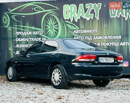 Зеленый Мазда Кседос 6, объемом двигателя 2 л и пробегом 213 тыс. км за 1900 $, фото 7 на Automoto.ua