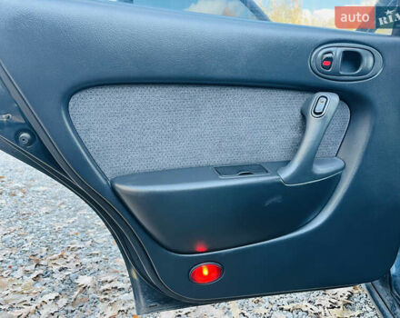 Зеленый Мазда Кседос 6, объемом двигателя 2 л и пробегом 213 тыс. км за 1900 $, фото 15 на Automoto.ua