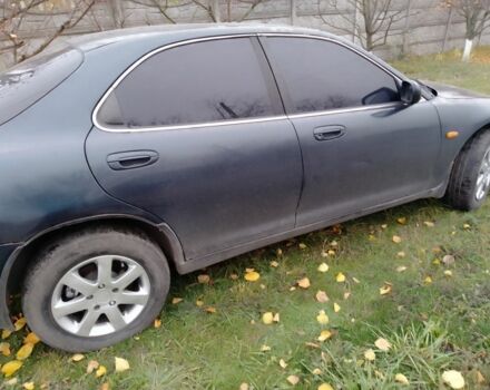 Зеленый Мазда Кседос 6, объемом двигателя 2 л и пробегом 400 тыс. км за 1500 $, фото 4 на Automoto.ua