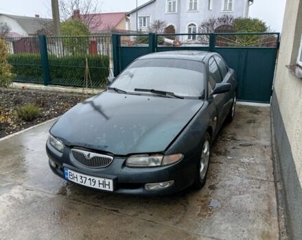 Зеленый Мазда Кседос 6, объемом двигателя 2 л и пробегом 200 тыс. км за 1300 $, фото 2 на Automoto.ua