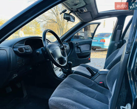 Зеленый Мазда Кседос 6, объемом двигателя 2 л и пробегом 213 тыс. км за 1900 $, фото 8 на Automoto.ua