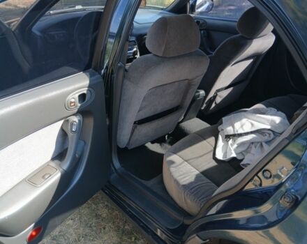 Зелений Мазда Кседос 6, об'ємом двигуна 2 л та пробігом 375 тис. км за 3100 $, фото 5 на Automoto.ua