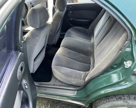 Зелений Мазда Кседос 6, об'ємом двигуна 2 л та пробігом 490 тис. км за 2000 $, фото 6 на Automoto.ua