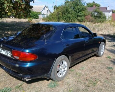 Зелений Мазда Кседос 6, об'ємом двигуна 2 л та пробігом 375 тис. км за 3100 $, фото 2 на Automoto.ua