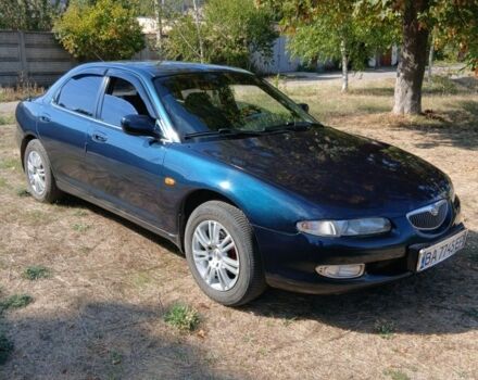 Зелений Мазда Кседос 6, об'ємом двигуна 2 л та пробігом 375 тис. км за 3100 $, фото 4 на Automoto.ua