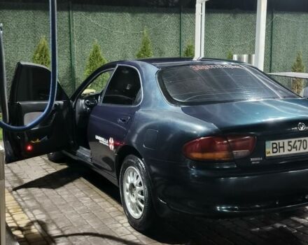 Зеленый Мазда Кседос 6, объемом двигателя 2 л и пробегом 300 тыс. км за 2600 $, фото 1 на Automoto.ua