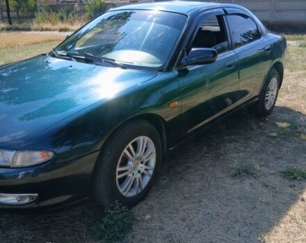 Зелений Мазда Кседос 6, об'ємом двигуна 2 л та пробігом 375 тис. км за 3100 $, фото 1 на Automoto.ua