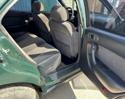 Зелений Мазда Кседос 6, об'ємом двигуна 2 л та пробігом 490 тис. км за 2000 $, фото 7 на Automoto.ua