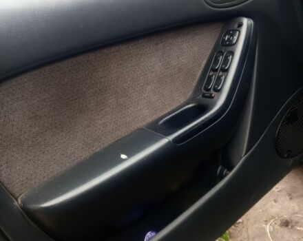 Зелений Мазда Кседос 6, об'ємом двигуна 2 л та пробігом 353 тис. км за 1700 $, фото 7 на Automoto.ua