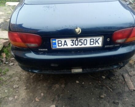 Зелений Мазда Кседос 6, об'ємом двигуна 2 л та пробігом 353 тис. км за 1700 $, фото 2 на Automoto.ua