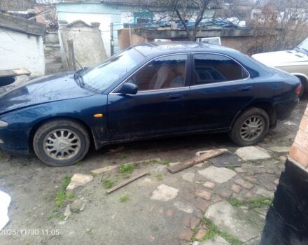 Зелений Мазда Кседос 6, об'ємом двигуна 2 л та пробігом 353 тис. км за 1700 $, фото 1 на Automoto.ua