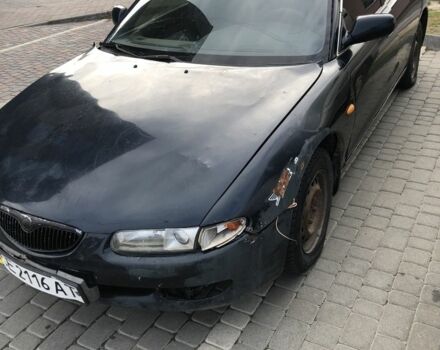 Зелений Мазда Кседос 6, об'ємом двигуна 2 л та пробігом 243 тис. км за 1100 $, фото 1 на Automoto.ua