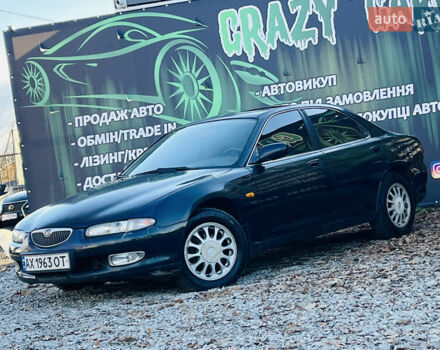 Зеленый Мазда Кседос 6, объемом двигателя 2 л и пробегом 213 тыс. км за 1900 $, фото 1 на Automoto.ua