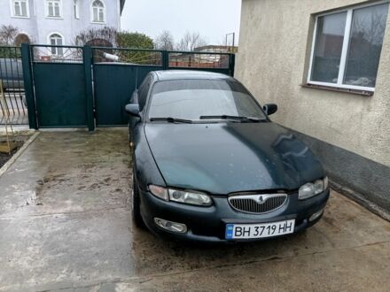 Зеленый Мазда Кседос 6, объемом двигателя 2 л и пробегом 200 тыс. км за 1300 $, фото 1 на Automoto.ua