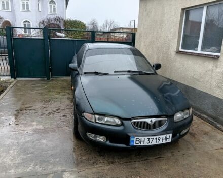 Зеленый Мазда Кседос 6, объемом двигателя 2 л и пробегом 200 тыс. км за 1300 $, фото 1 на Automoto.ua