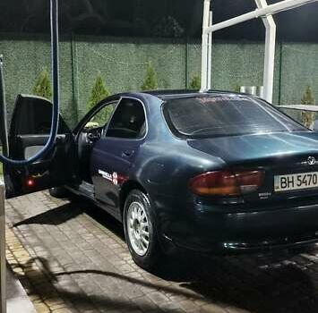 Зелений Мазда Кседос 6, об'ємом двигуна 2 л та пробігом 300 тис. км за 2600 $, фото 1 на Automoto.ua