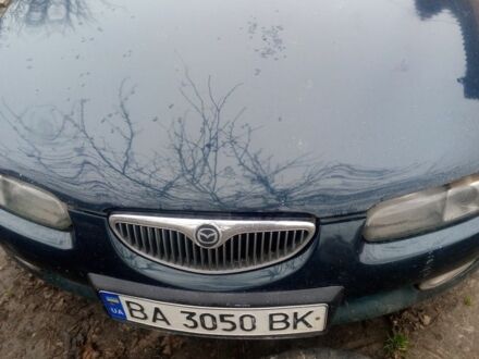 Зелений Мазда Кседос 6, об'ємом двигуна 2 л та пробігом 353 тис. км за 1700 $, фото 1 на Automoto.ua