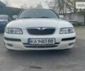 Белый Мазда Кседос 9, объемом двигателя 2.5 л и пробегом 410 тыс. км за 3300 $, фото 1 на Automoto.ua