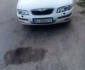 Білий Мазда Кседос 9, об'ємом двигуна 2.5 л та пробігом 337 тис. км за 2850 $, фото 1 на Automoto.ua