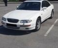 Білий Мазда Кседос 9, об'ємом двигуна 2.5 л та пробігом 265 тис. км за 3200 $, фото 1 на Automoto.ua