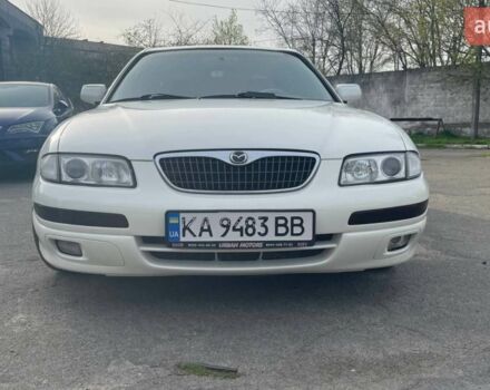 Белый Мазда Кседос 9, объемом двигателя 2.5 л и пробегом 410 тыс. км за 3000 $, фото 1 на Automoto.ua